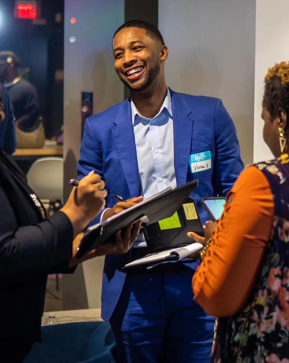 Reviewing materials at a networking event