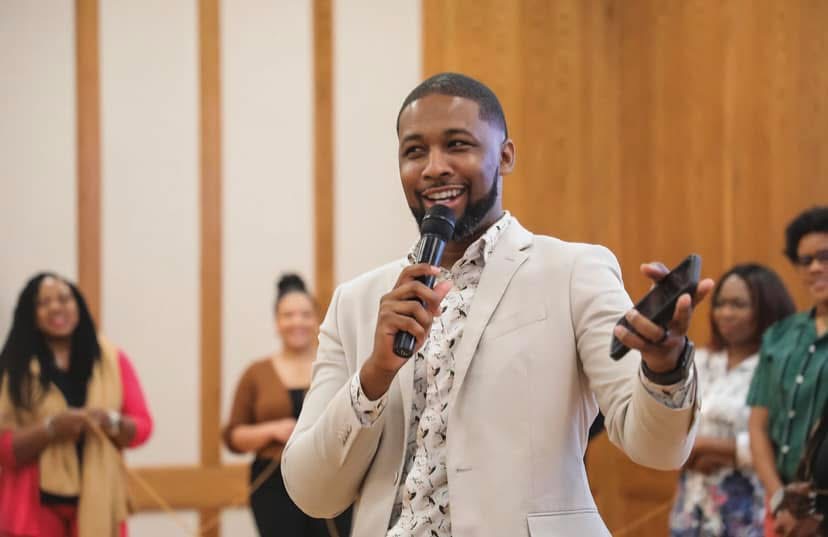 Xavier DeBrough addressing an audience